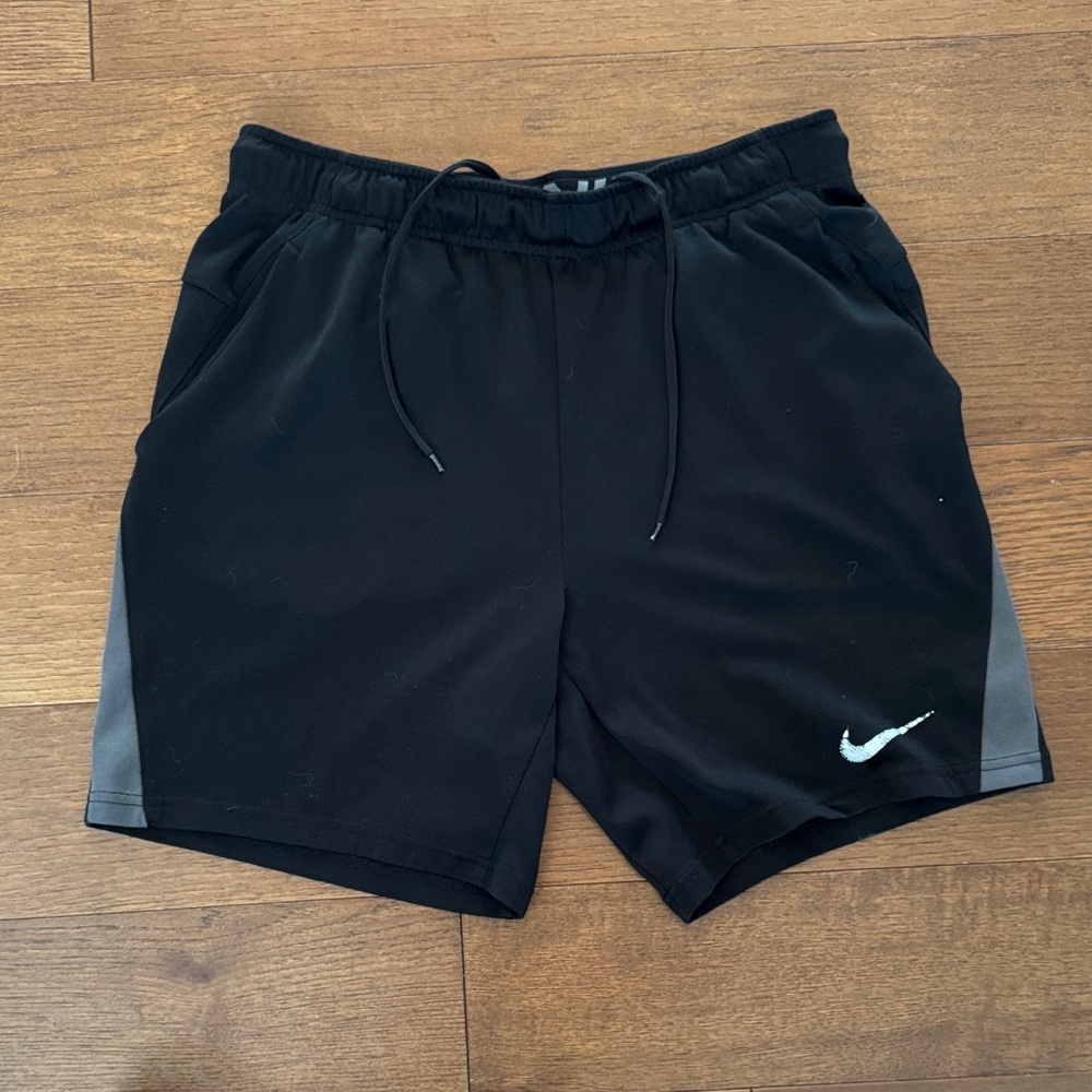 Nike Men's Black Athletic Shorts with Gray Side Panels and White Swoosh
